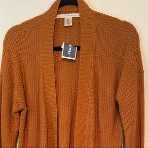 Mex studio burnt orange sweater. New with tags never worn.